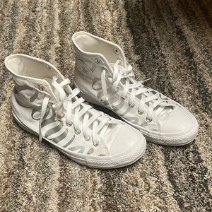 White and Silver Spelled Out High Top Converse